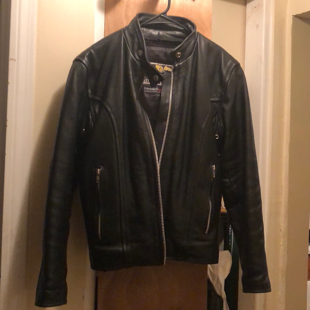 Women’s size 8 heavy duty motorcycle jacket.